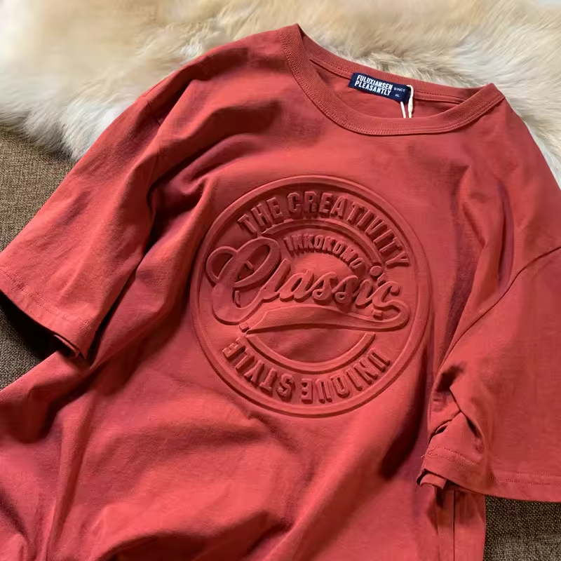 Embossed Designs on T-Shirts: Unveiling The Textured Truth Behind The Raised Effect